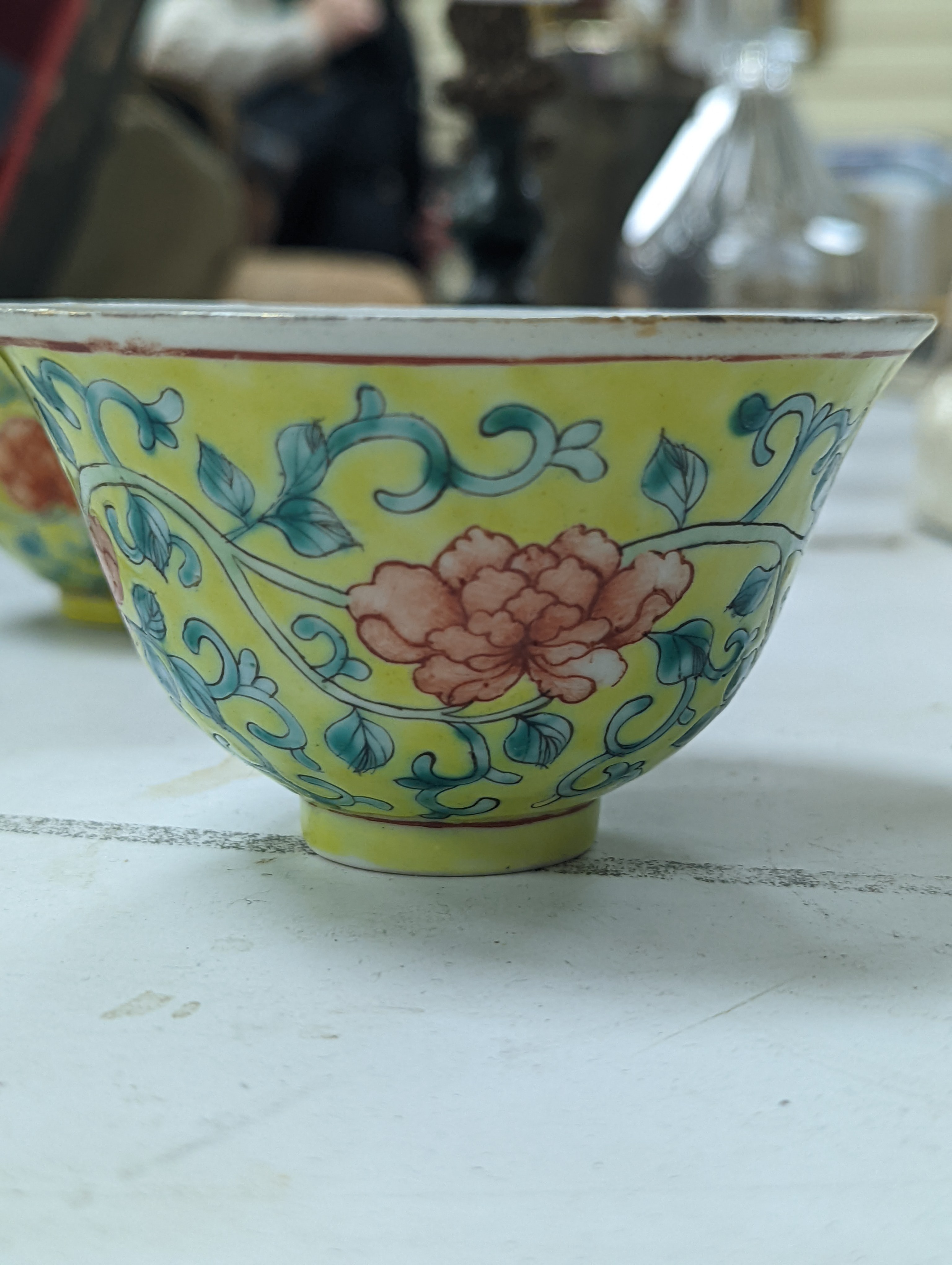 A group of Chinese porcelain, 19th /20th century, to include a pair of yellow ground bowls, 10.8 cm diameter, a blue and white vase, Xuande mark, a similar bowl and vase, and a champleve enamel bronze koro and cover